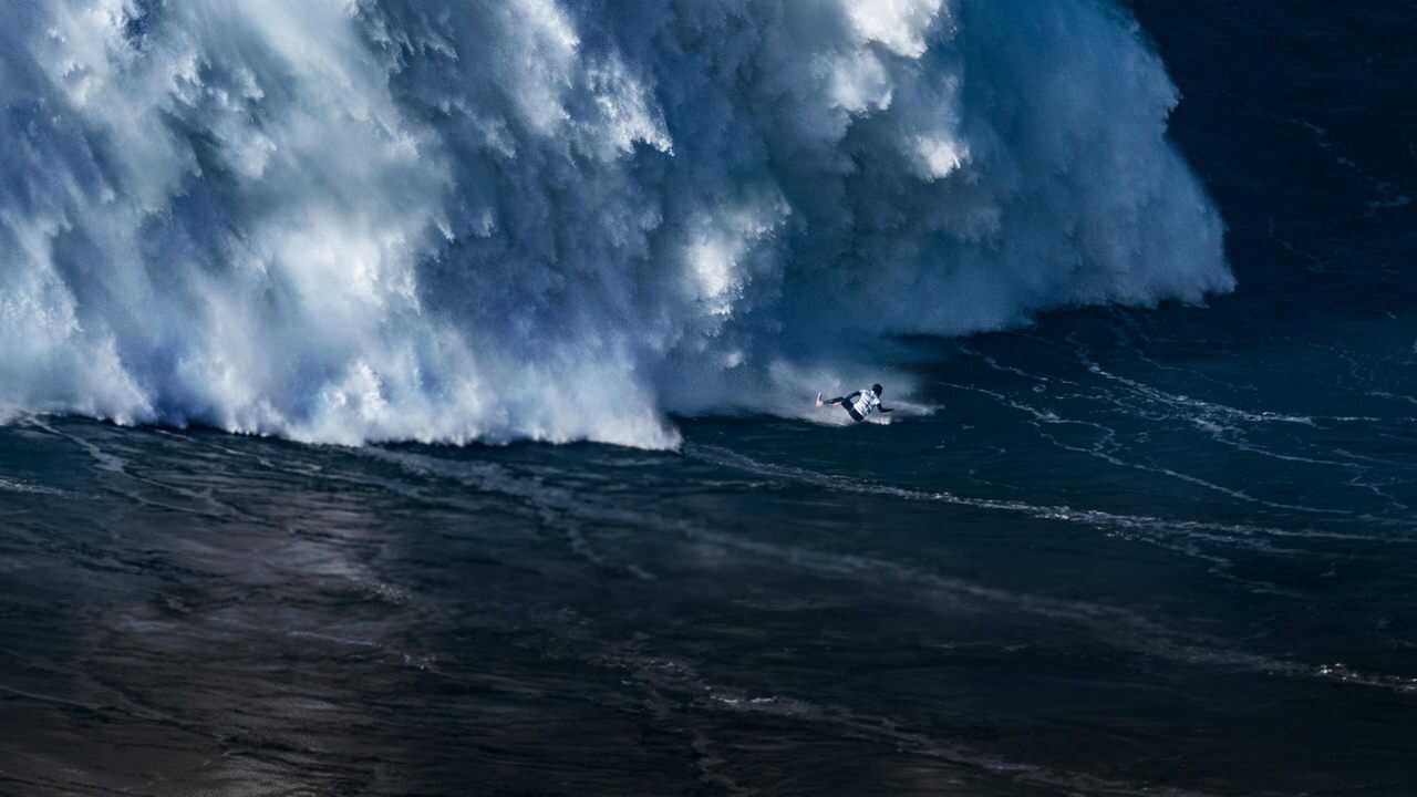 FR - Surfer la méga vague 0